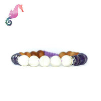 The Seahorse Spirit Animal Bracelet | Amethyst + Pearl Mala Beads
